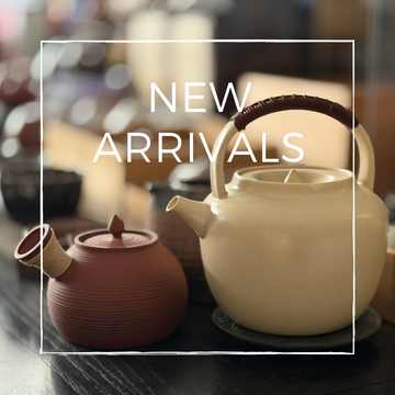New Arrivals graphic showing cream and reddish-brown ceramic teapots on a dark wooden surface
