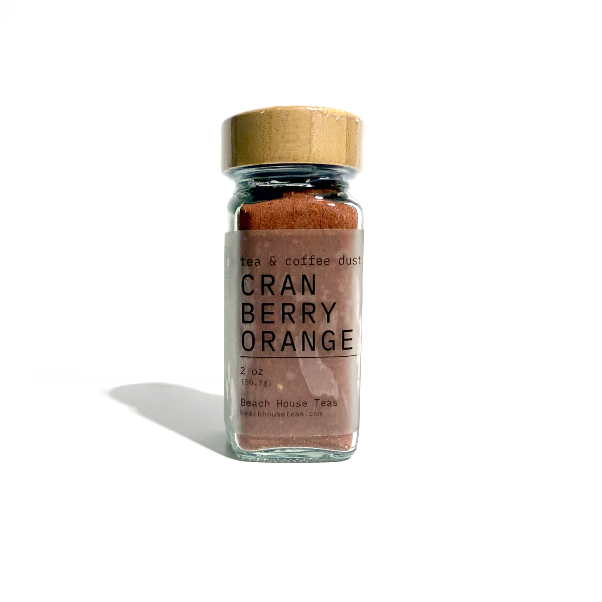 Beach House Teas Cranberry Orange tea and coffee dust in a 2 oz clear glass jar with a wooden lid