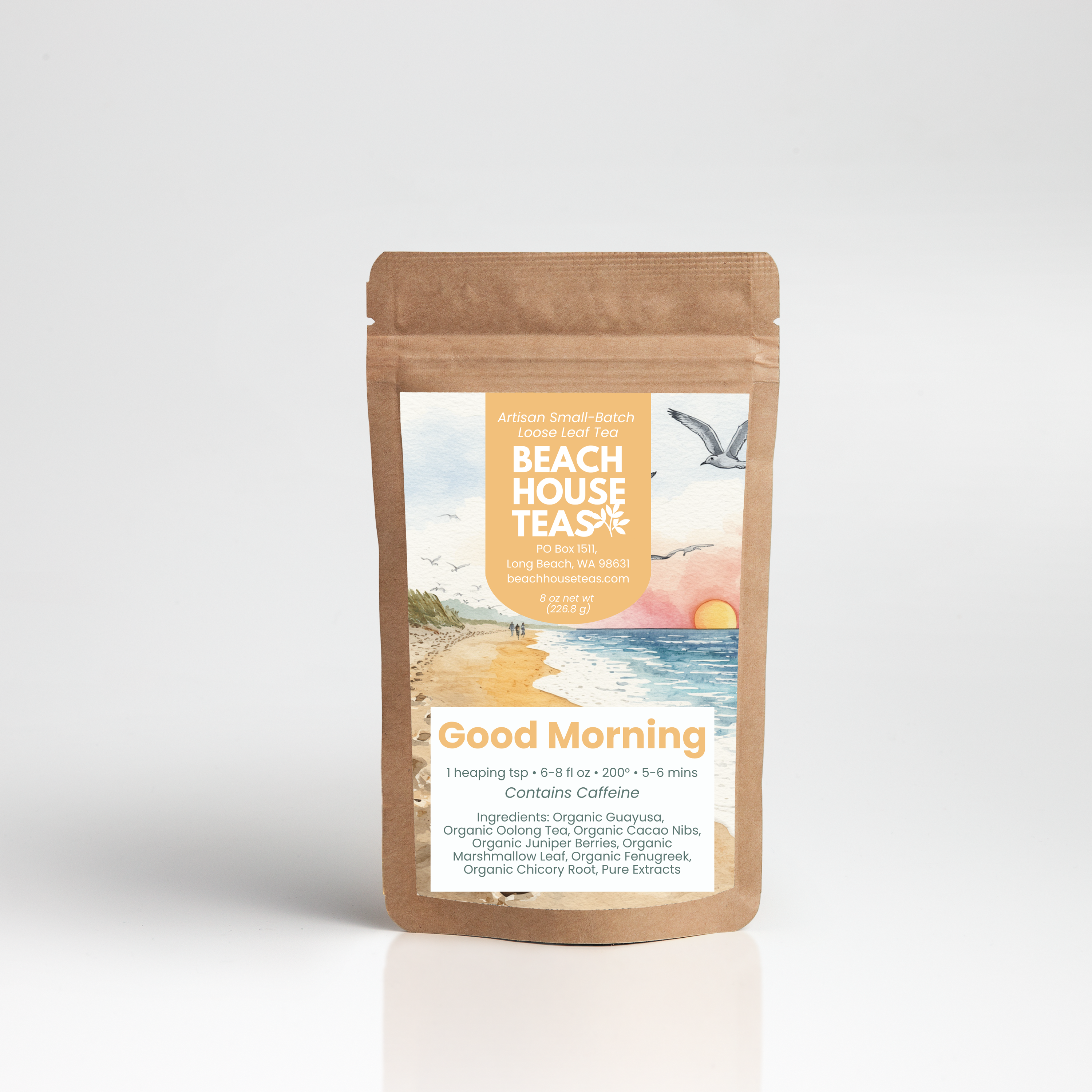 A stand-up kraft paper pouch of Beach House Tea's Good Morning herbal tea, featuring a beach-themed label, set against a clean white background with a soft reflection.