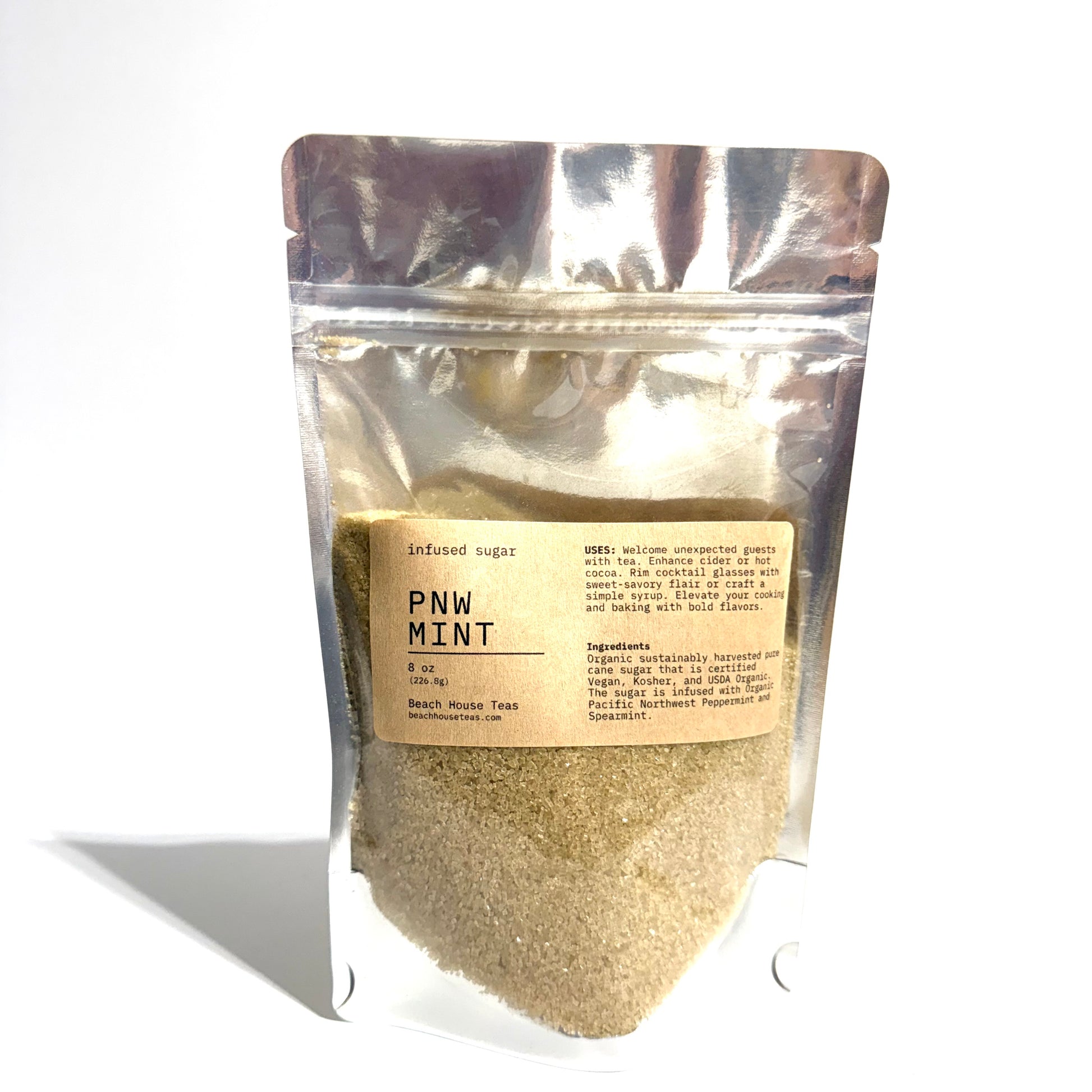 A stand-up pouch of PNW Mint flavored artificial sugar, showing the light brown granulated sugar inside through a clear lower section, with a beige label on a white background.