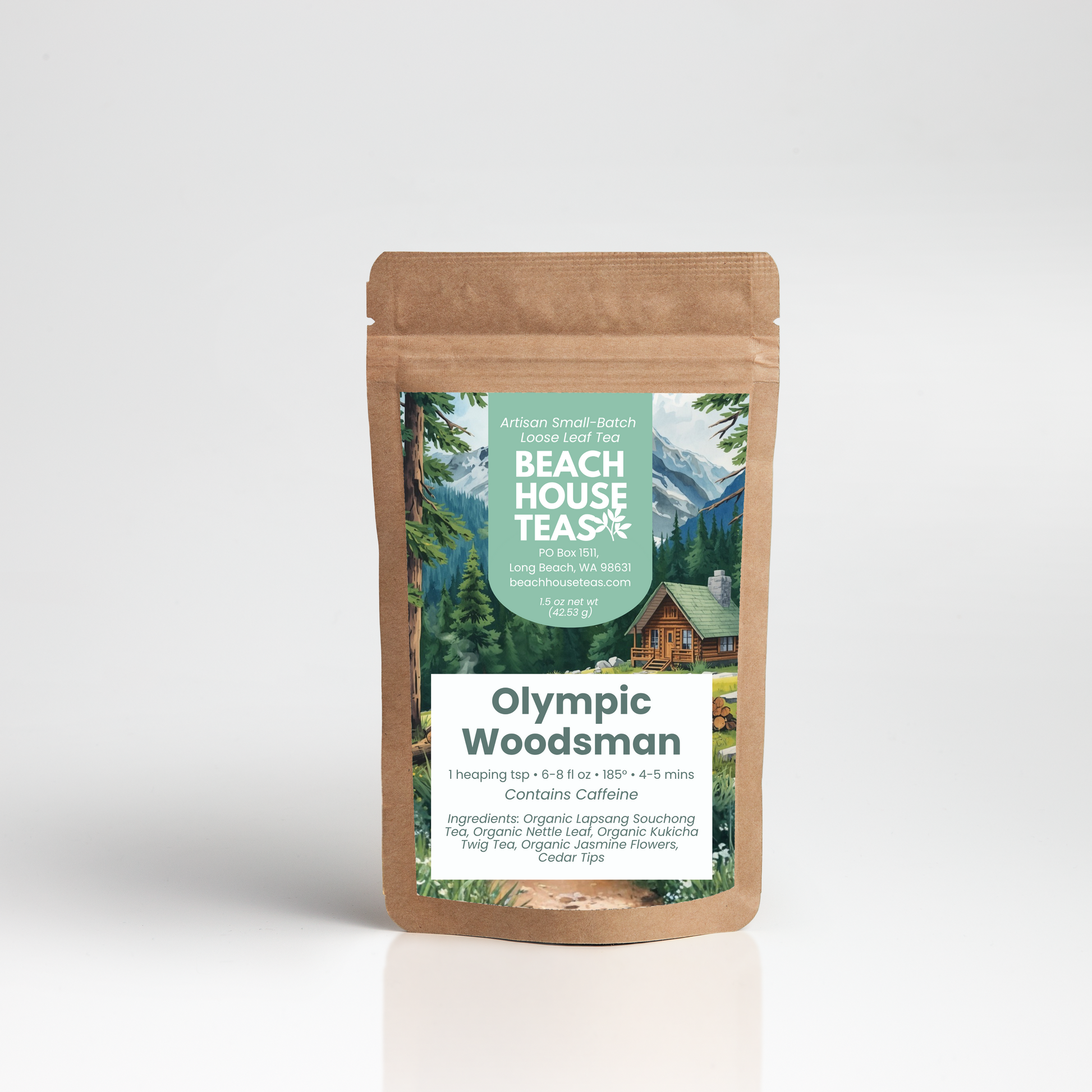 A stand-up pouch of Beach House Teas 'Olympic Woodsman' loose-leaf tea, featuring a kraft brown packaging with a scenic label of a mountain cabin and forest.