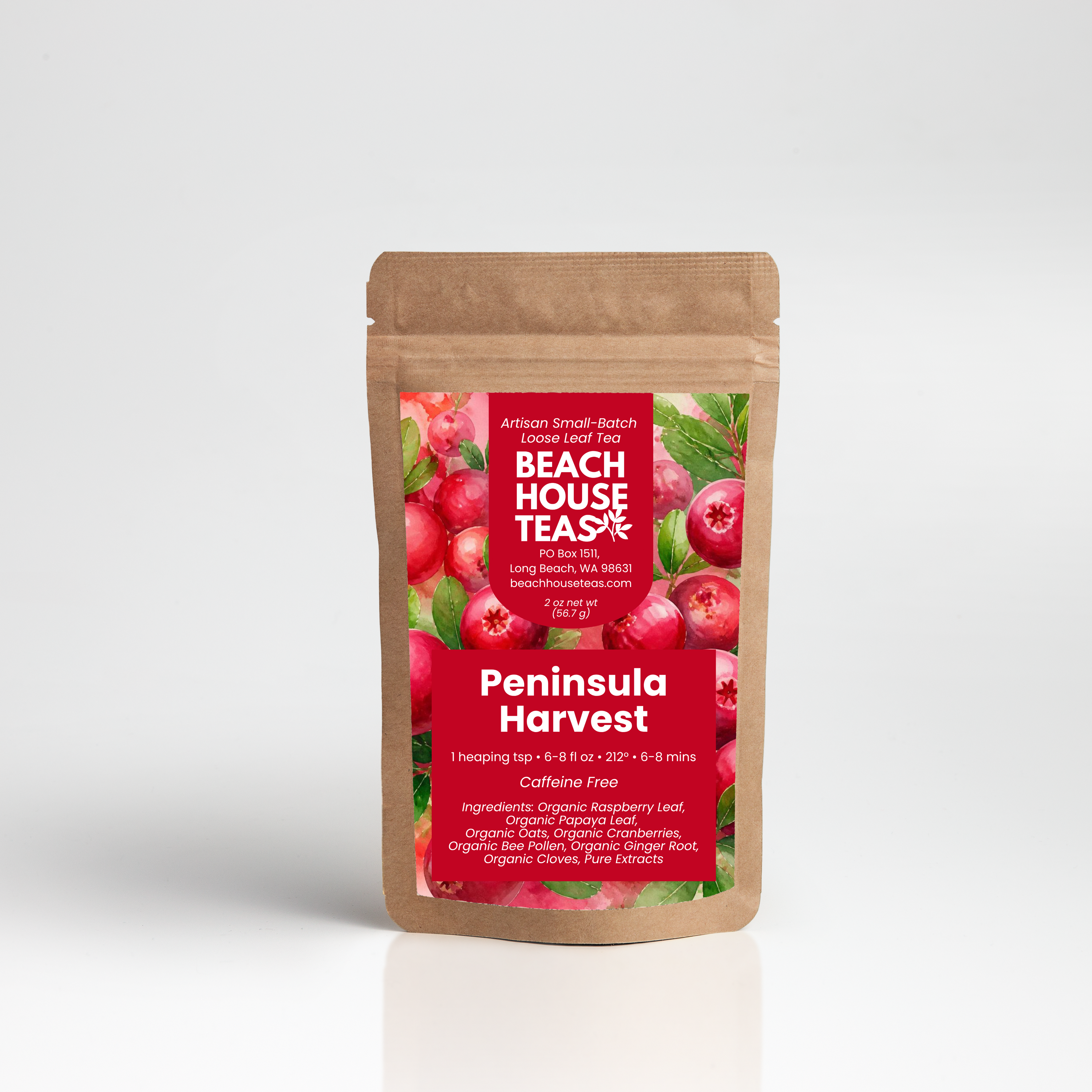 A stand-up kraft paper pouch of Beach House Teas 'Peninsula Harvest' loose leaf tea, featuring a red label with illustrations of fresh raspberries and green leaves, set against a clean white background.