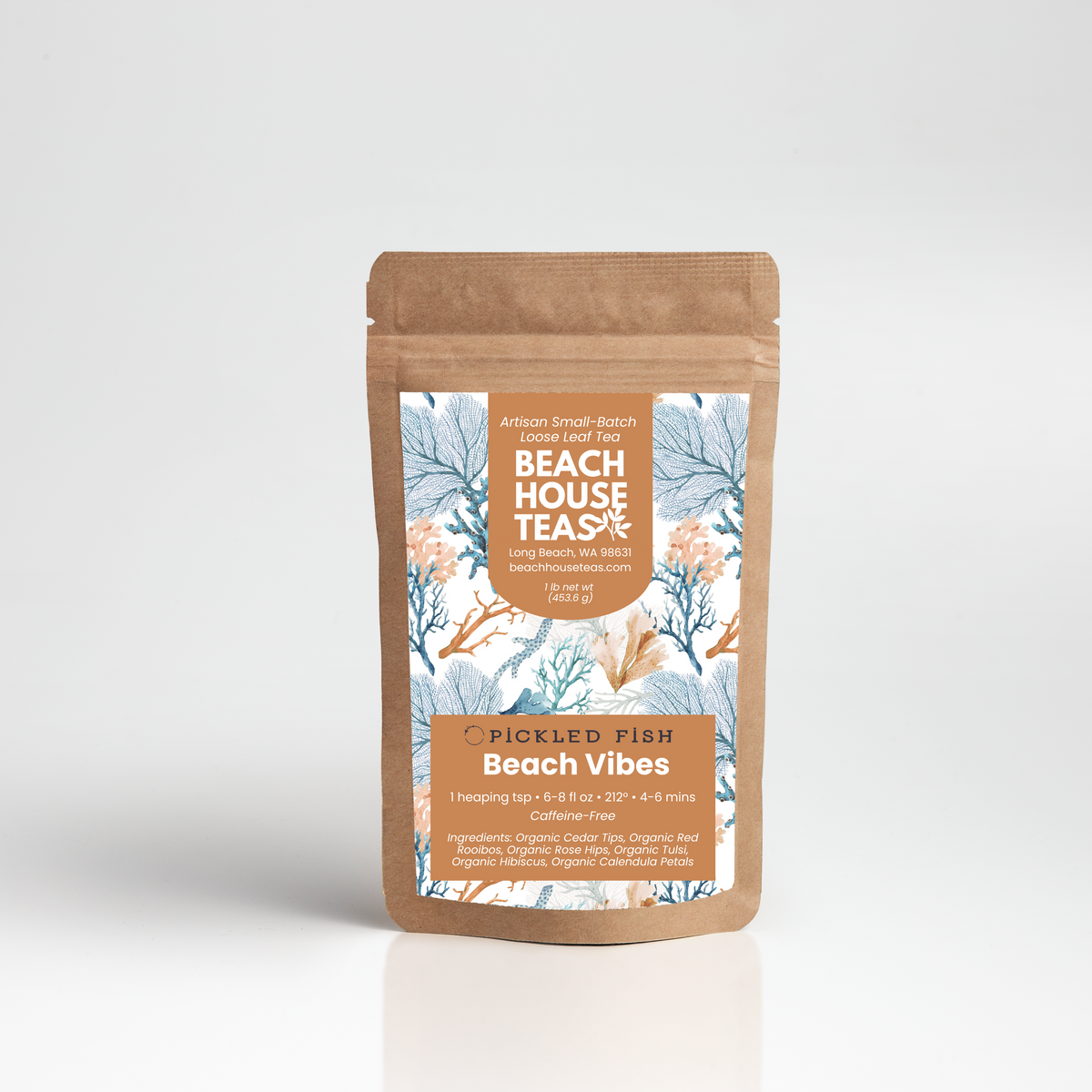 A stand-up kraft paper pouch of Hickled Fish Beach House Tea, featuring a colorful label with blue and orange illustrations of palm trees and the text 'Beach Vibes'.