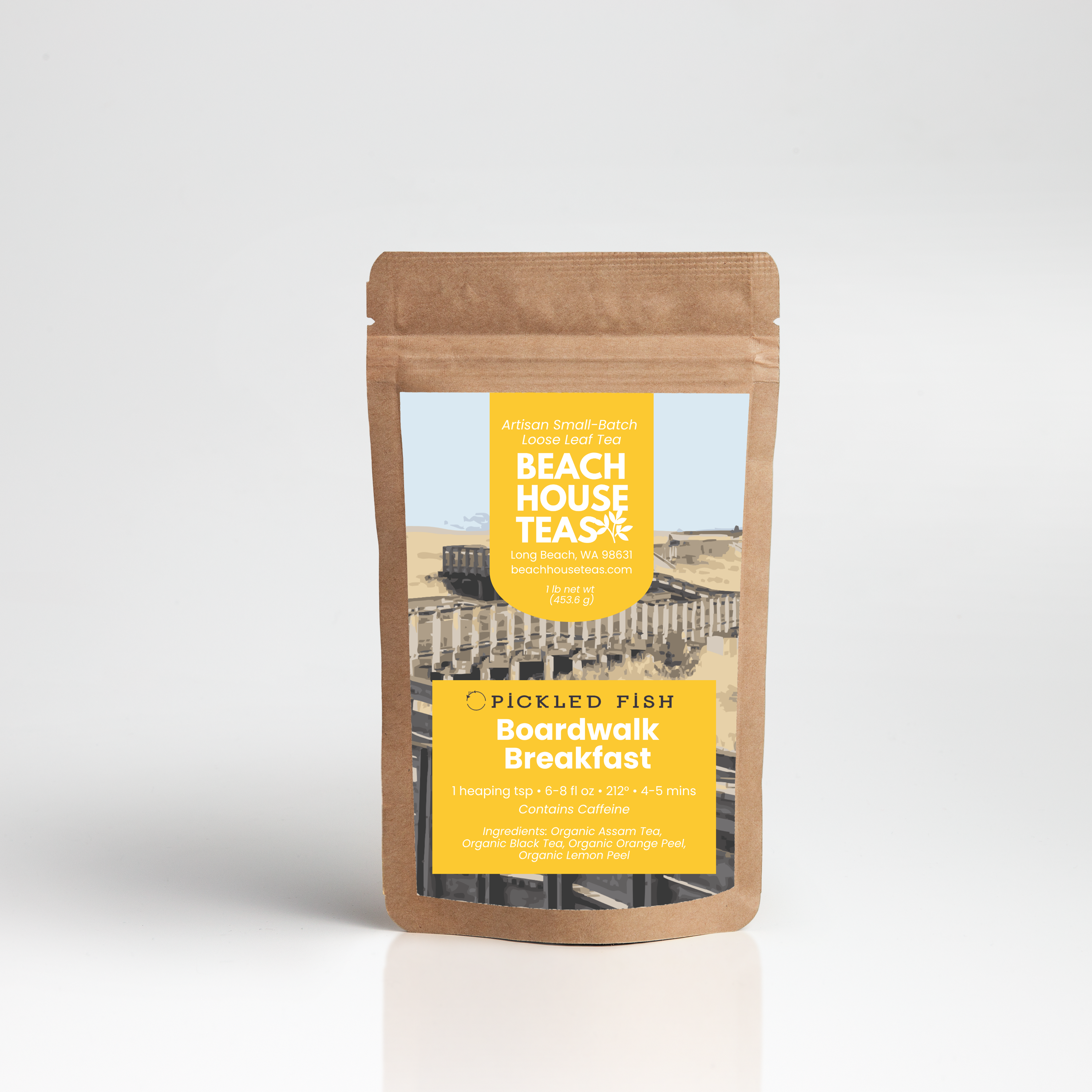 A kraft paper stand-up pouch of Pickle's Fish Beach House Breakfast tea, featuring a yellow label with a beach illustration, set against a light gray gradient background.