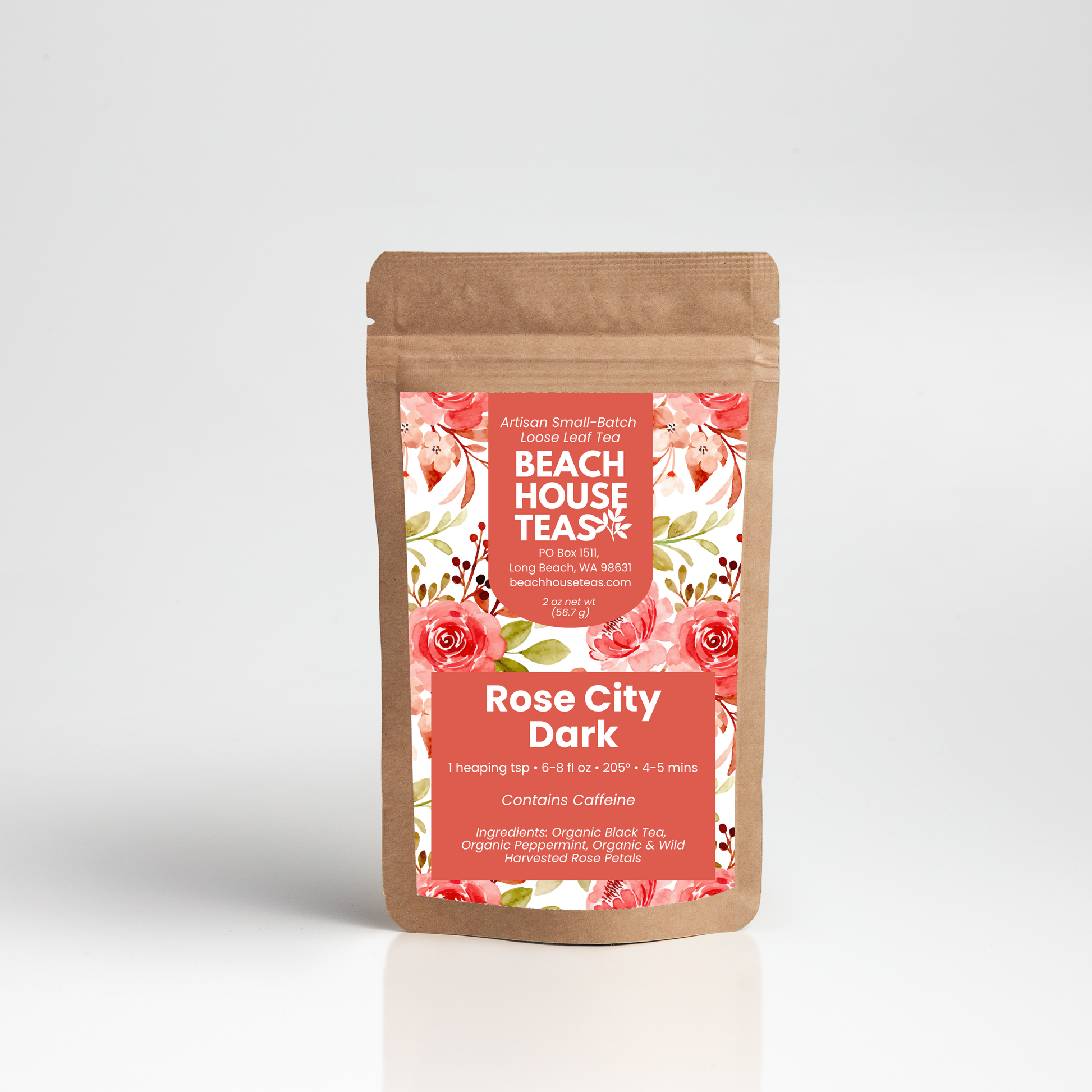 A stand-up kraft paper pouch of Beach House Teas Rose City Dark tea, featuring a coral and white floral label, set against a clean white background.