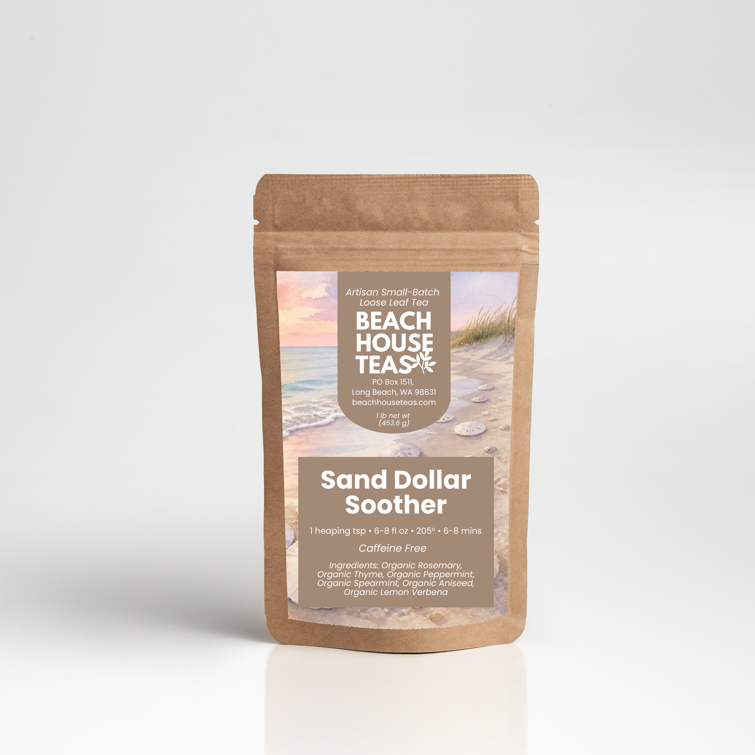 A stand-up kraft paper pouch of Beach House Tea's Sand Dollar Soother tea, featuring a beach-themed label, set against a clean white studio background with a soft reflection.