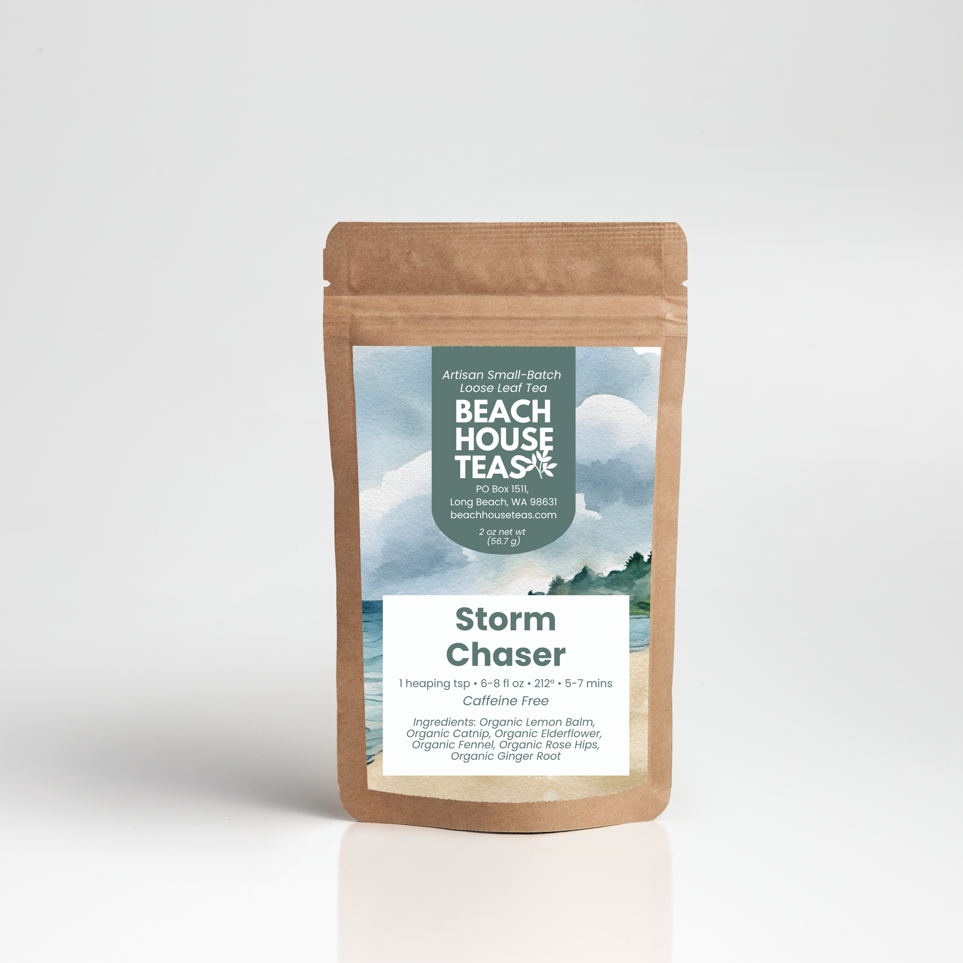 A stand-up kraft paper pouch of Beach House Tea Co. Storm Chaser loose-leaf tea, featuring a scenic label with a beach and ocean background, set against a clean white studio backdrop.