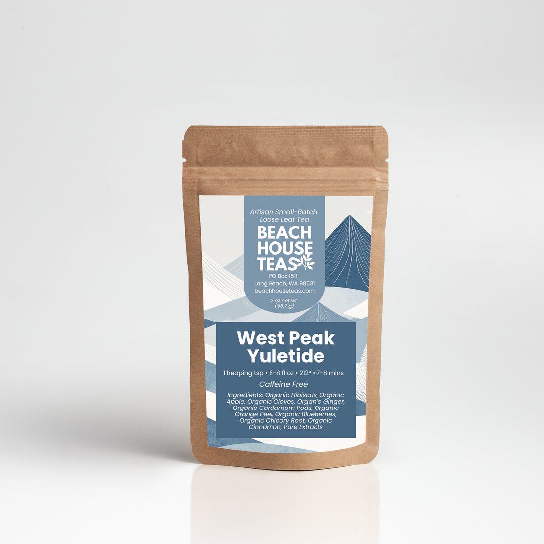 A stand-up kraft paper pouch of West Peak Yuletide coffee free herbal tea blend by Arctic Small Batch, featuring a blue and white label, set against a clean light gray background.