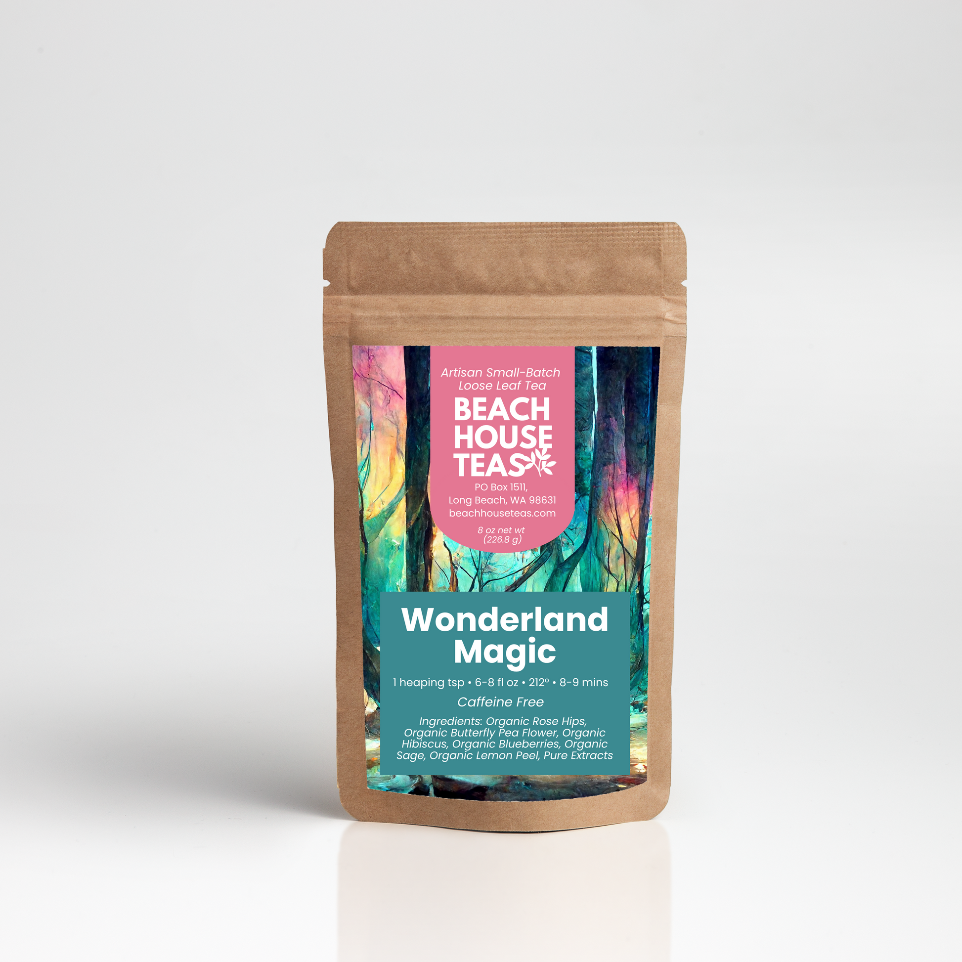 A kraft paper stand-up pouch of Beach House Teas 'Wonderland Magic' tea, featuring a colorful label with a forest design, set against a clean white background with a soft reflection.