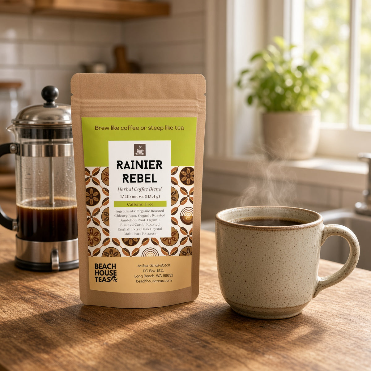 Rainier Rebel herbal coffee pouch beside a steaming ceramic mug and French press on a wooden kitchen counter