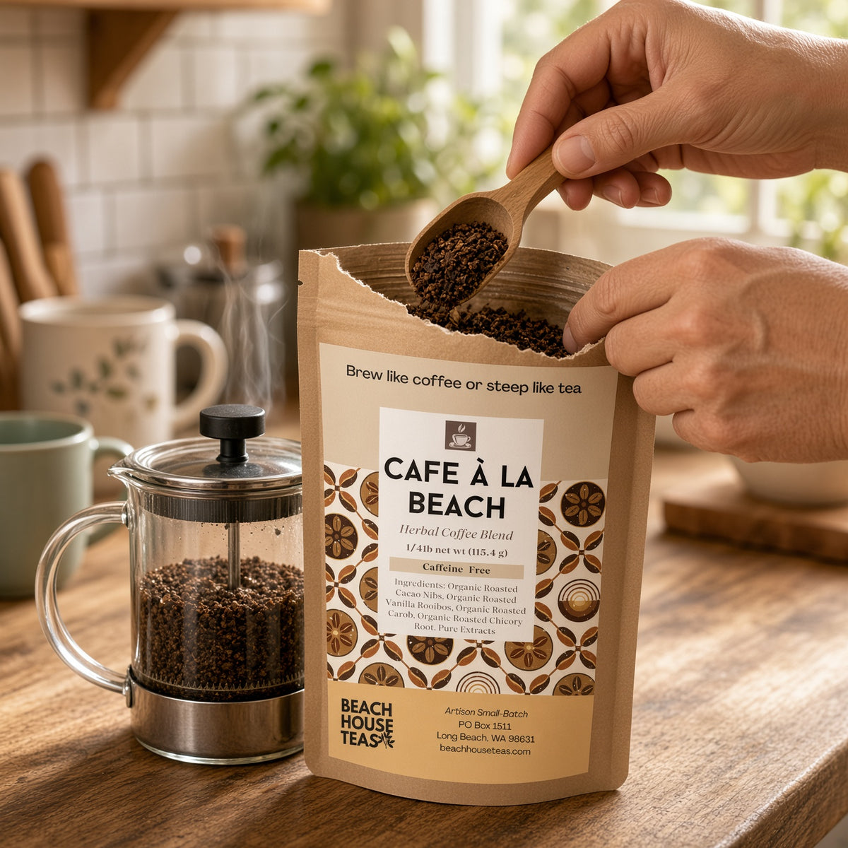 Hands scooping Café à la Beach Herbal Coffee from an open pouch beside a French press