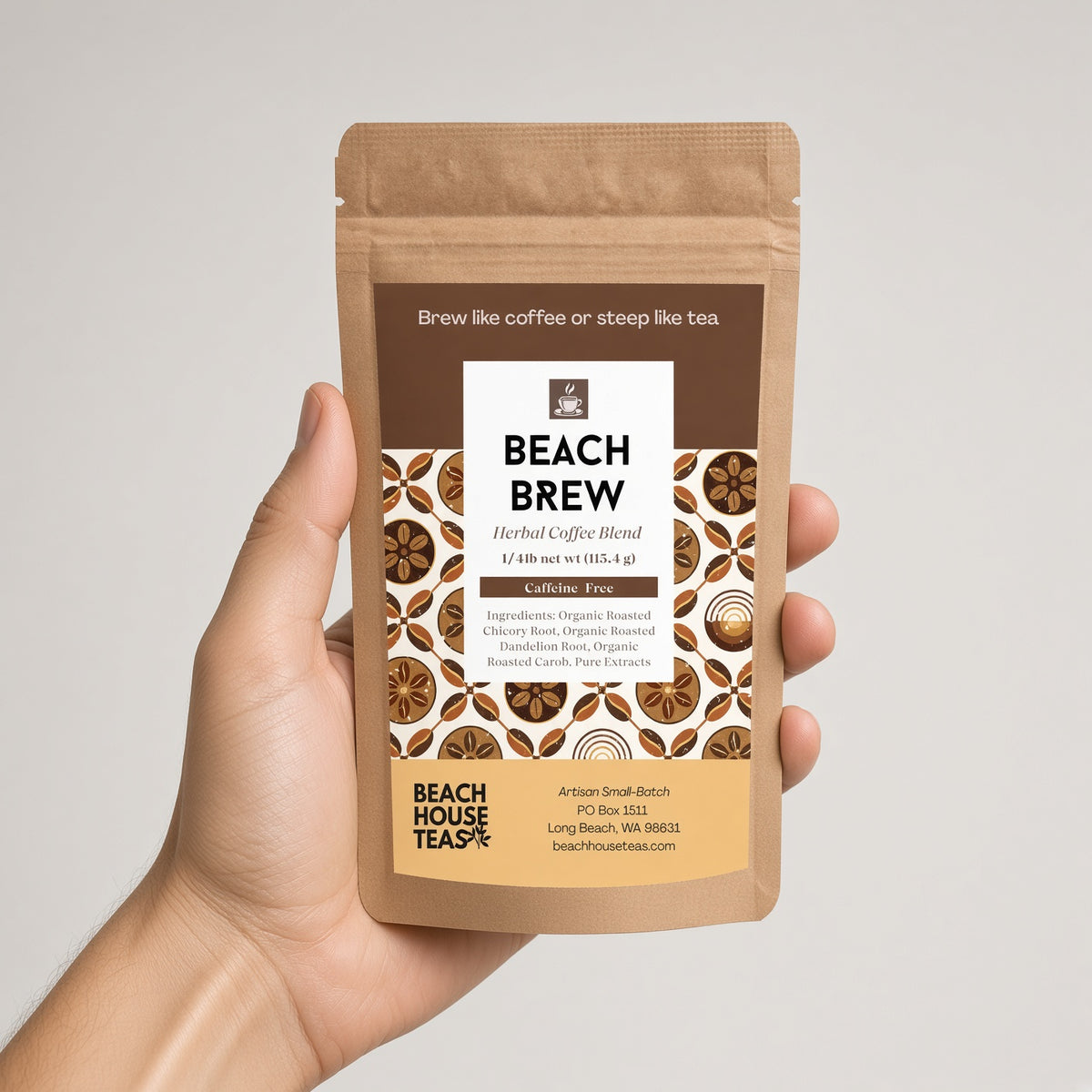 Hand holding a Beach Brew Herbal Coffee pouch against a light gray background