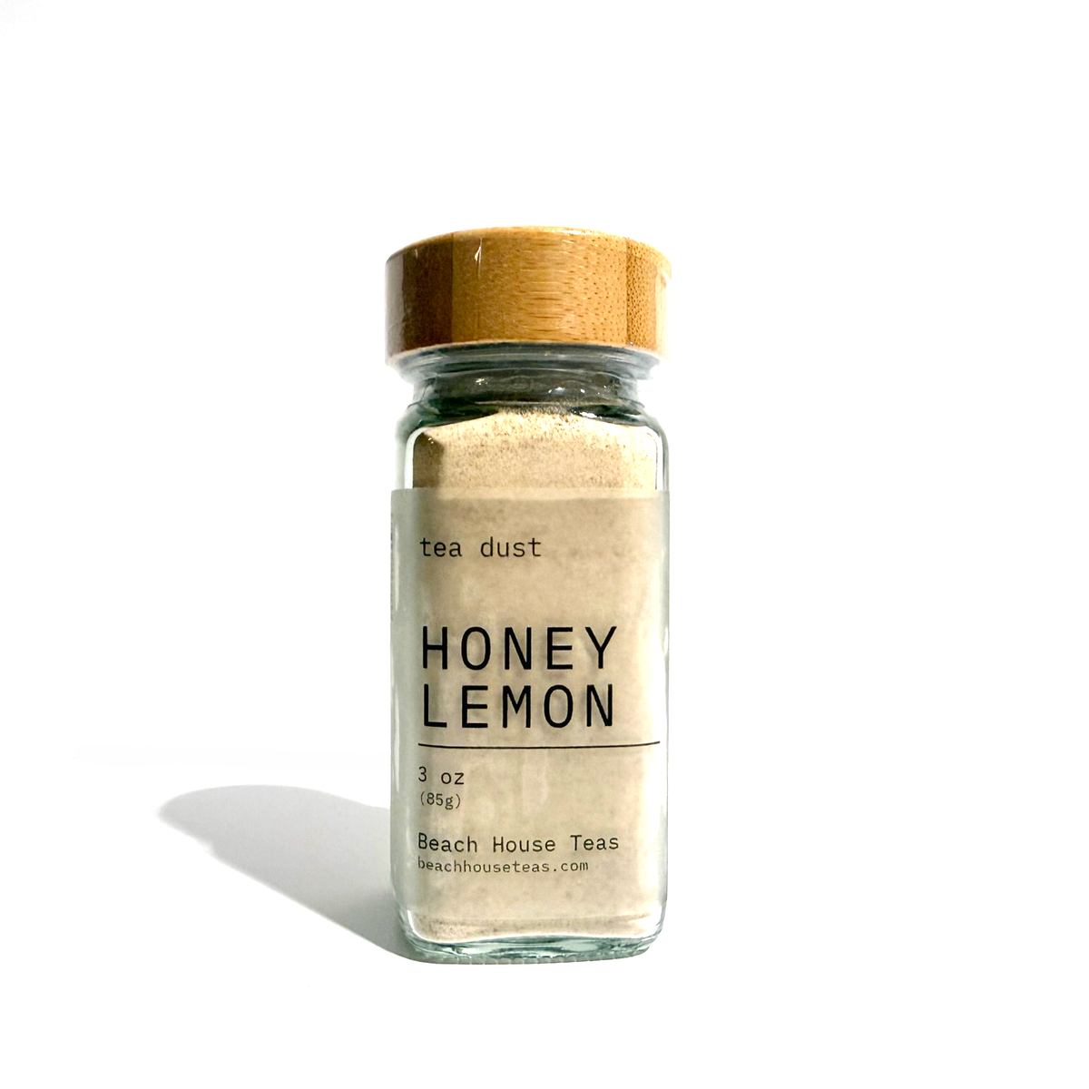 Beach House Teas Honey Lemon tea dust in a clear glass jar with a wooden lid