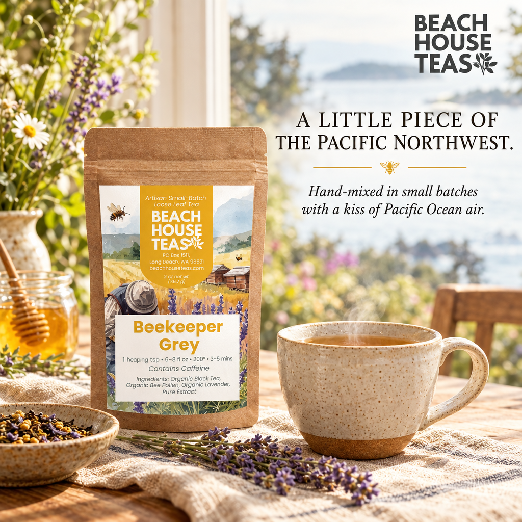 Beekeeper Grey pouch and ceramic tea mug on linen with lavender and a coastal view through a sunlit window.