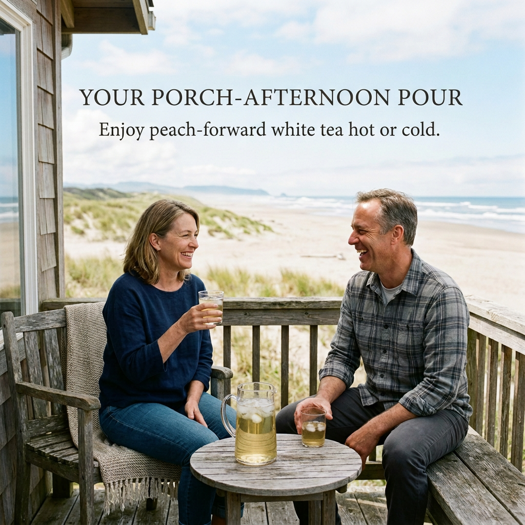 Two adults enjoying chilled pale golden white tea on a beach cottage porch.