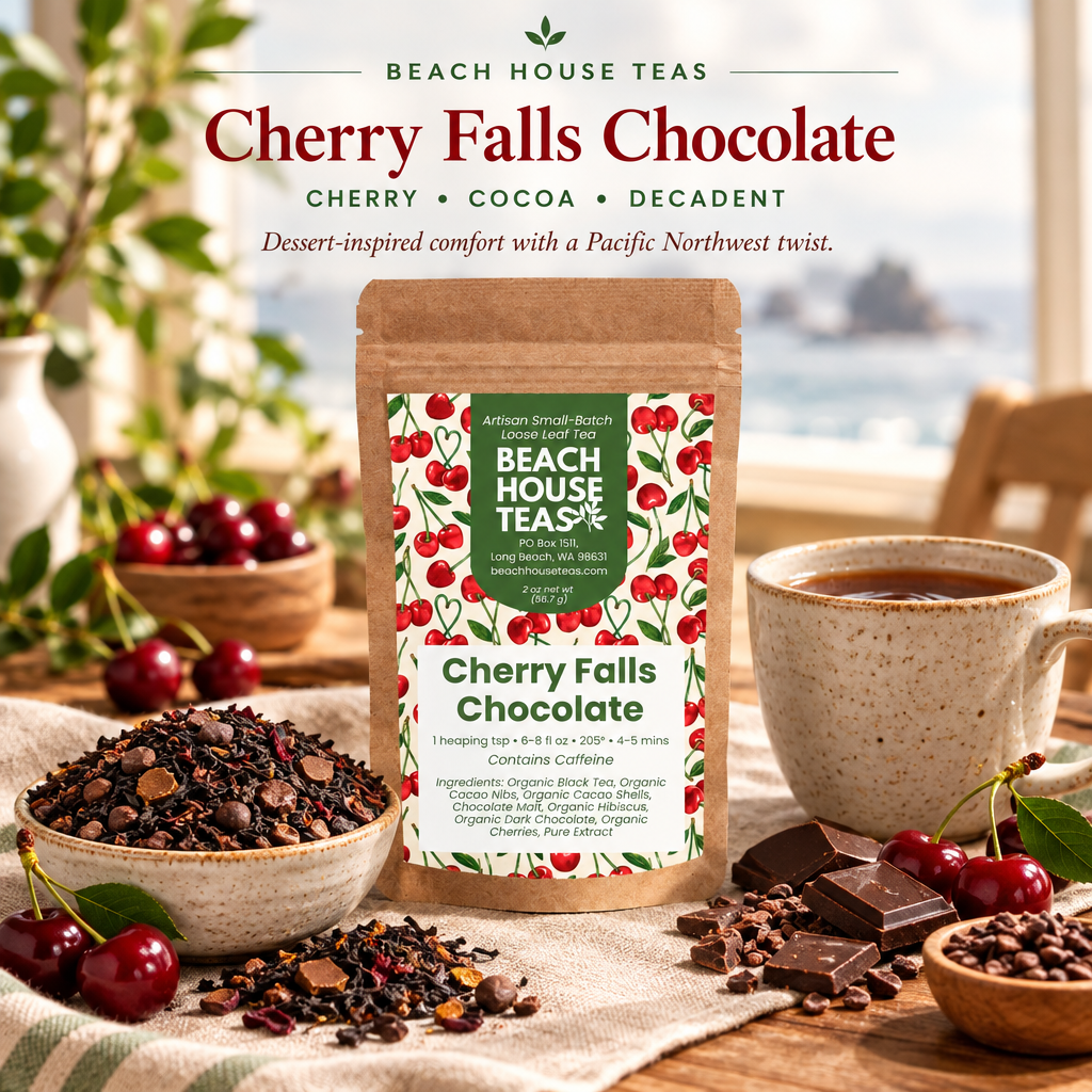 Cherry Falls Chocolate pouch with loose tea, cherries, cacao nibs and dark chocolate beside a ceramic tea mug.