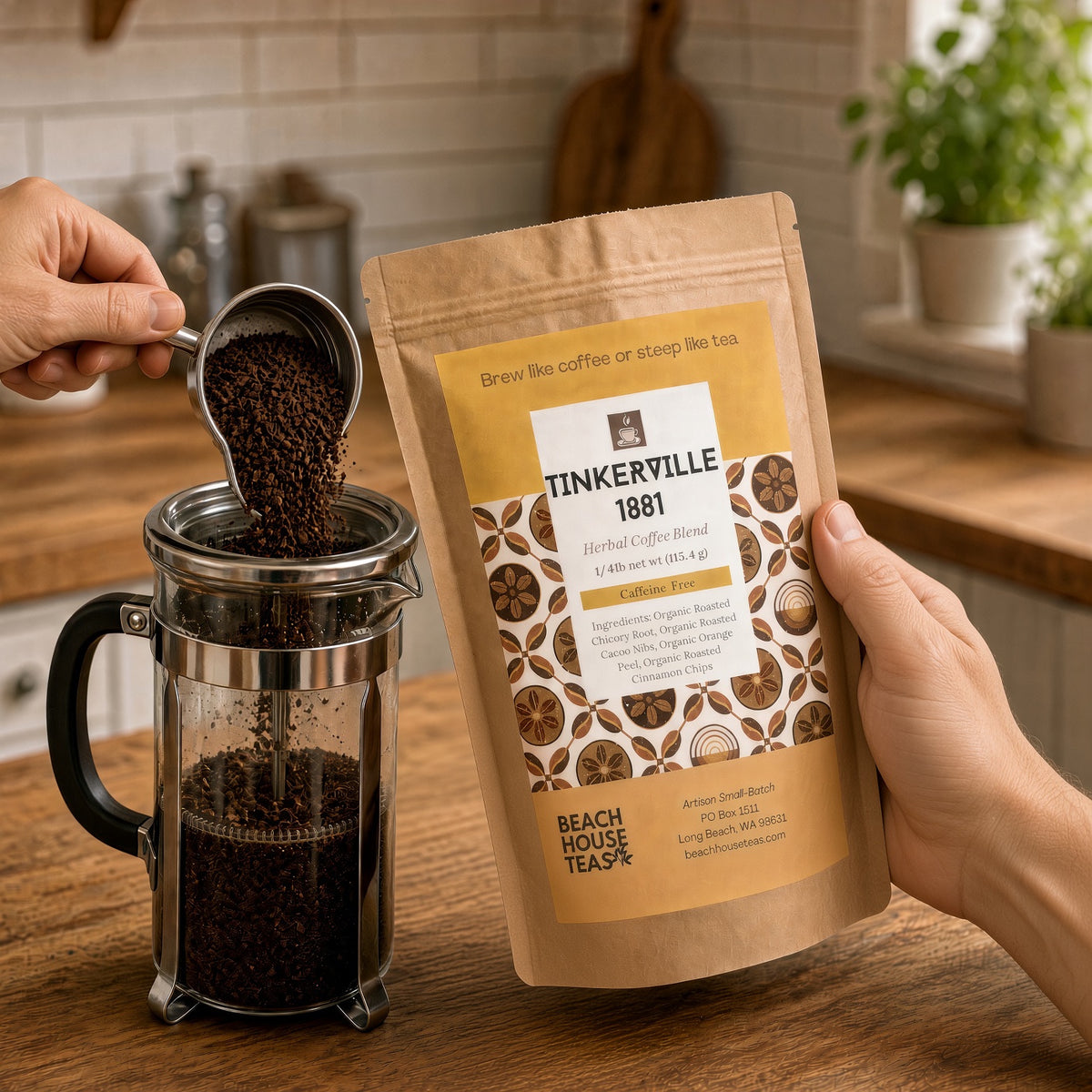 Person pouring Tinkerville 1881 herbal coffee from a metal scoop into a glass French press beside the kraft pouch